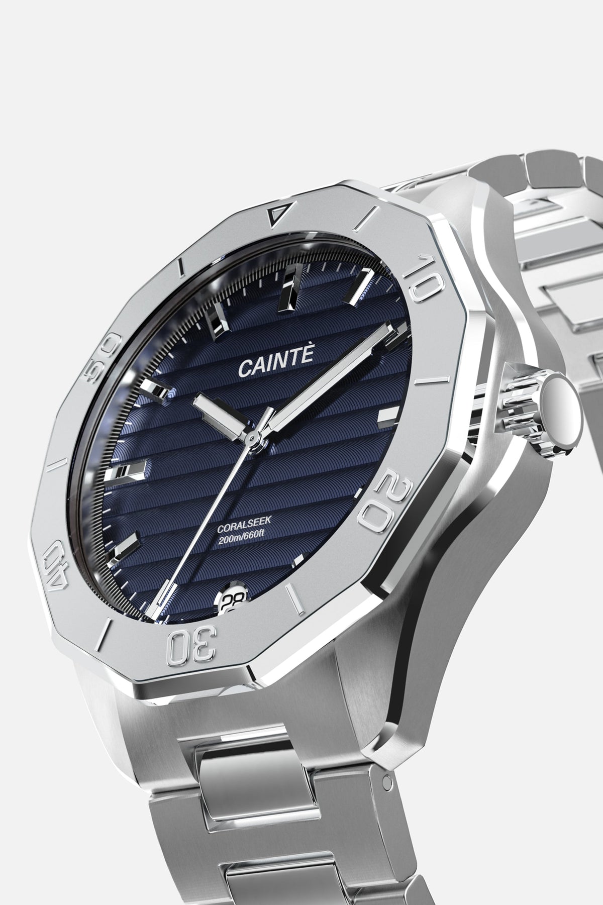 Three-quarter view of the faceted, numbered bezel and blue dial