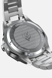 Solid case back with an engraved coral motif