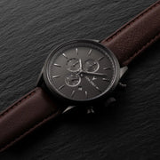 Gunmetal chronograph on dark slate