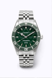 Green dial and bezel watch on a steel bracelet