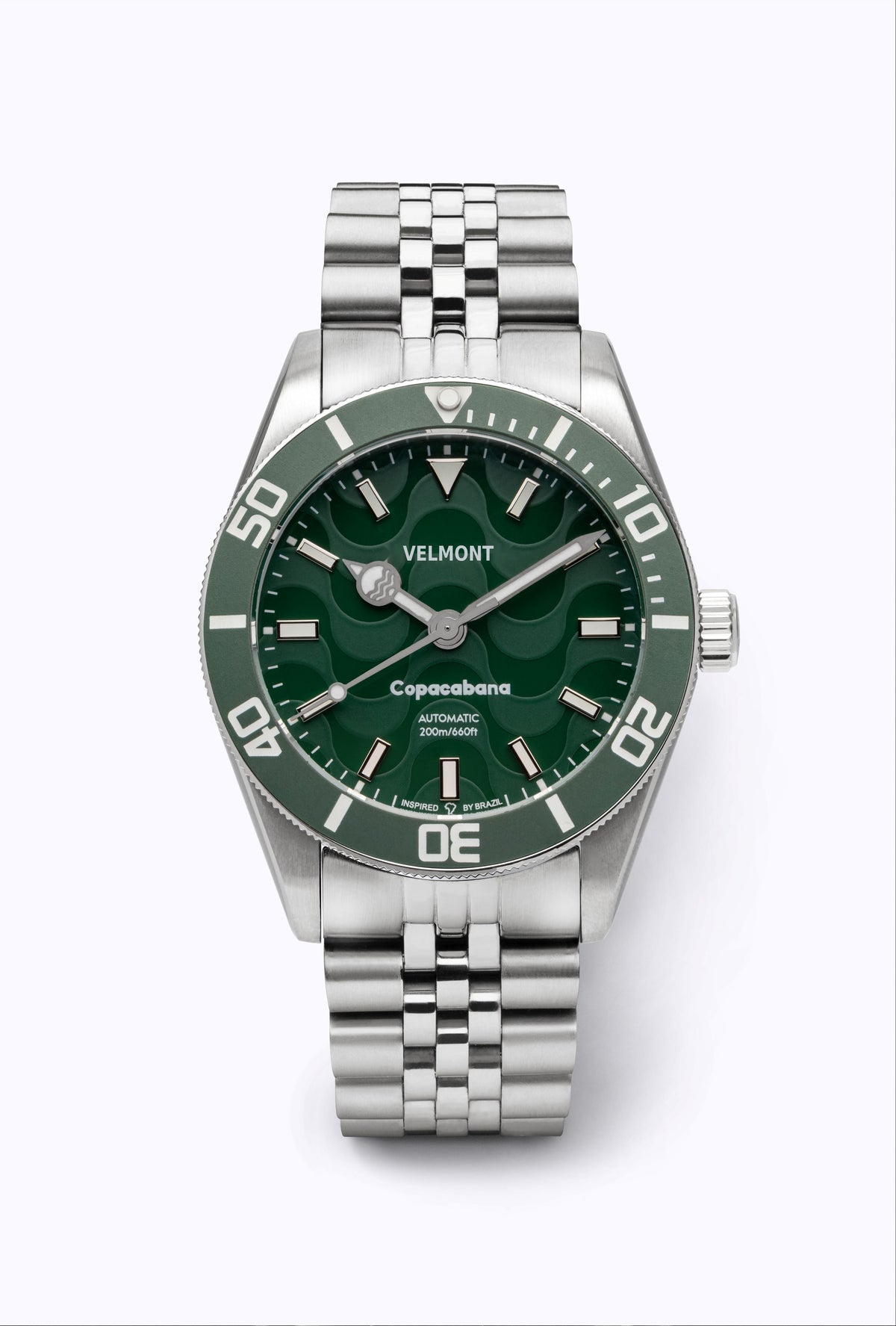 Green dial and bezel watch on a steel bracelet