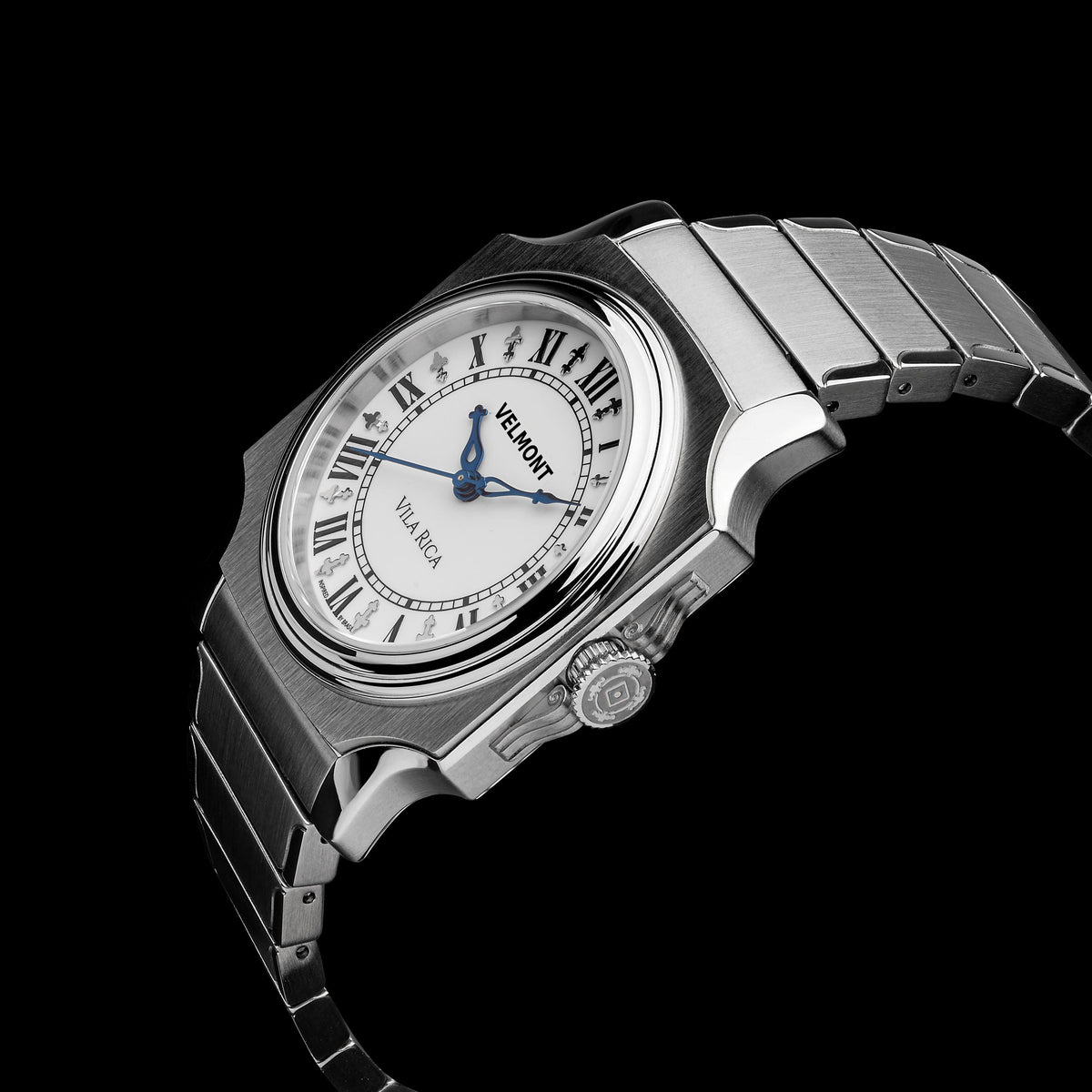 Steel watch at an angle on a black background
