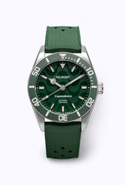 Green dial watch on a green perforated rubber strap