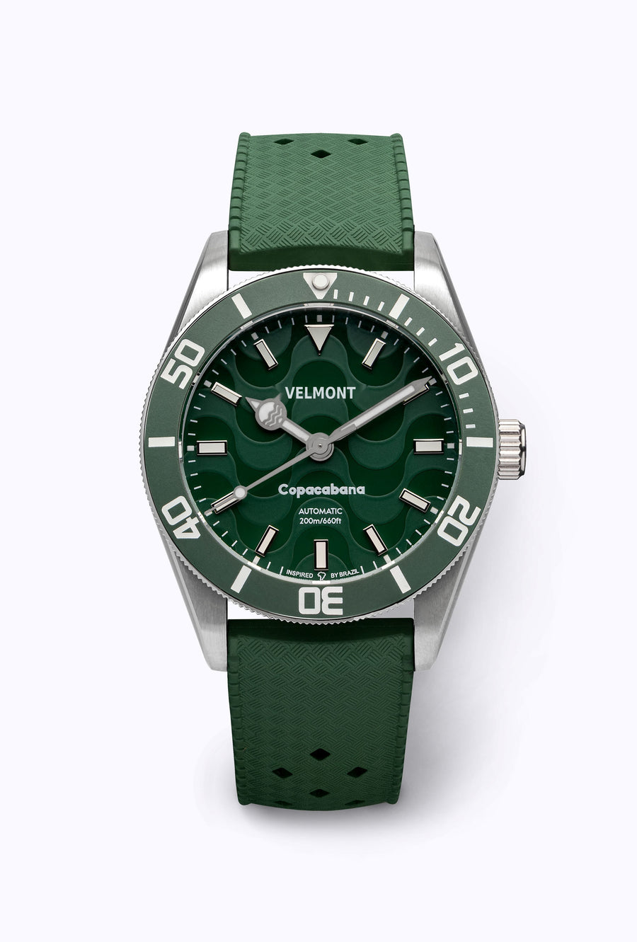 Green dial watch on a green perforated rubber strap