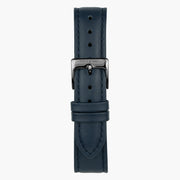 Navy strap with tonal stitching and a gunmetal pin buckle, laid out flat.
