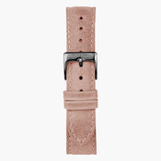 Dusty pink strap with light contrast stitching and a gunmetal buckle.