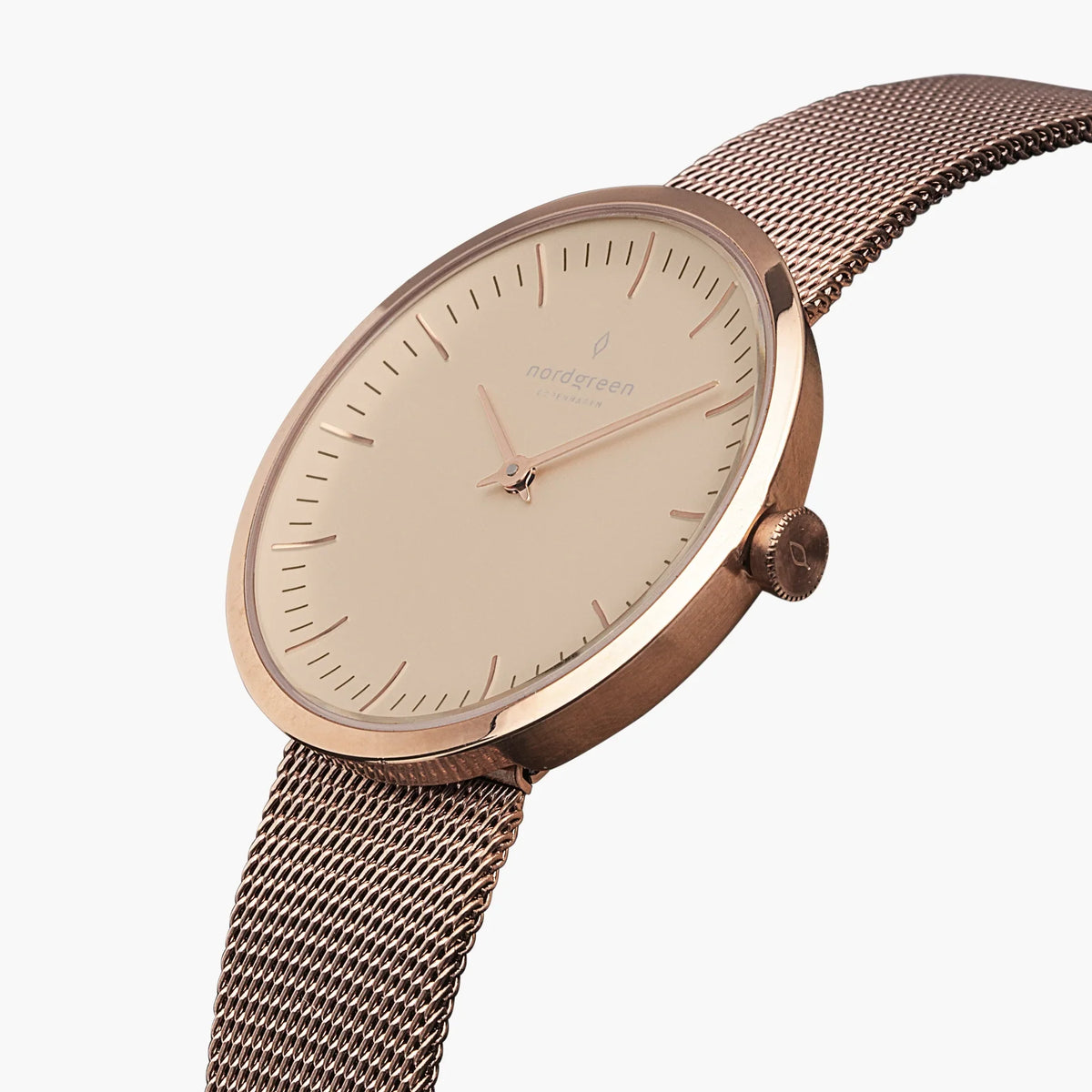 Angled look at the slim rose gold-tone case with a darker toned mesh band.