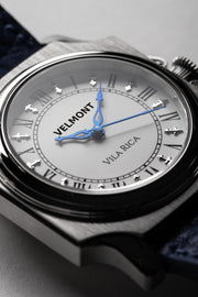Dial and blued hands at an angle
