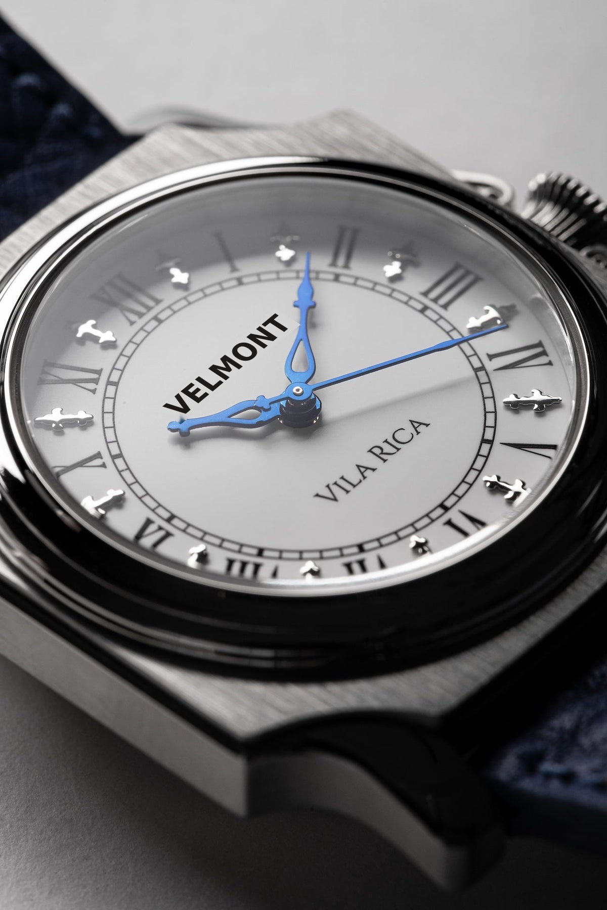 Dial and blued hands at an angle