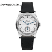 Silver-dial dress watch with overlay text, black background
