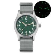 Green-dial military watch with glow-in-the-dark inset