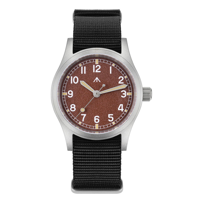Red-brown dial military watch on a black nylon strap