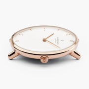 Side view of the rose gold-tone case highlighting the slim profile.