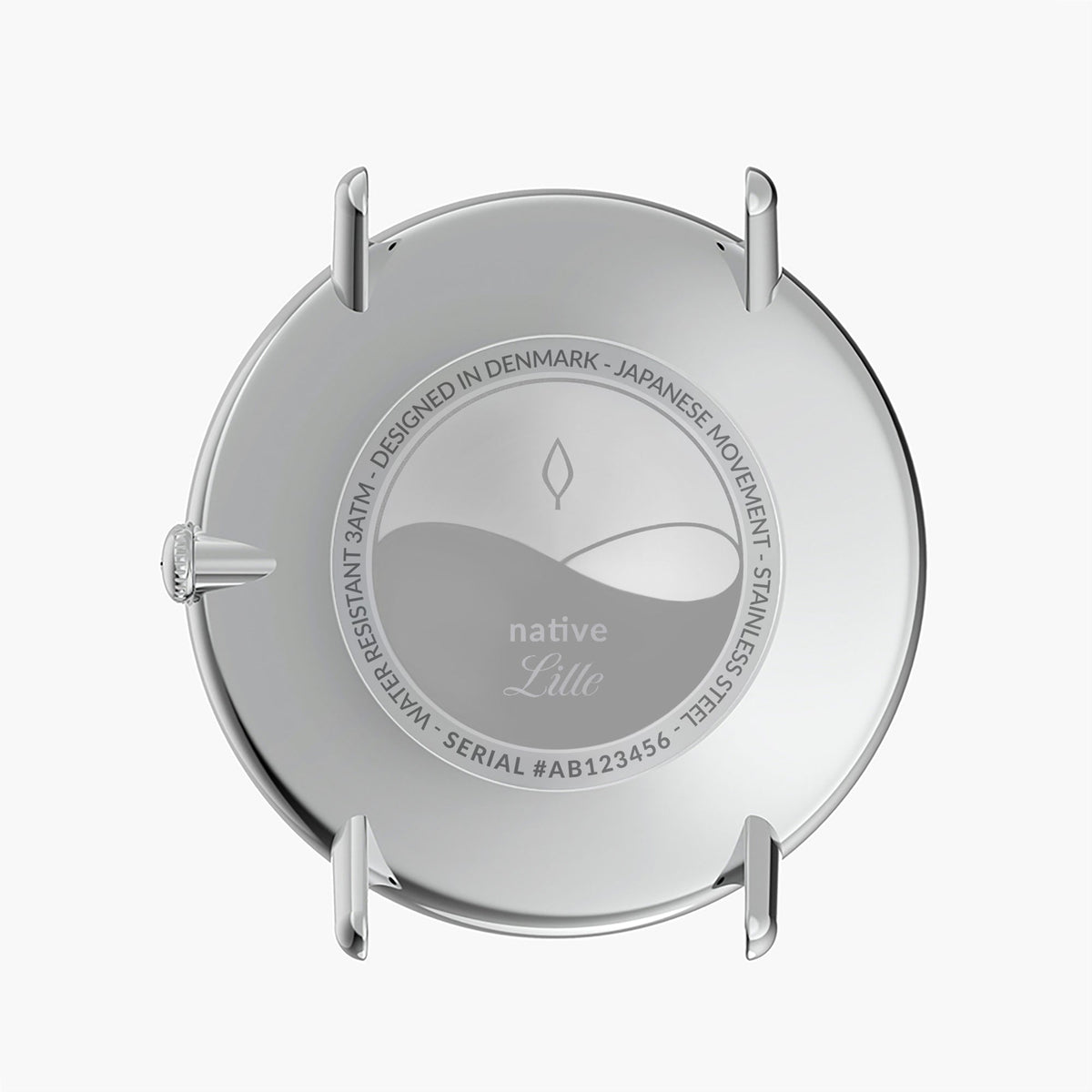 Engraved silver-tone case back of the watch, photographed flat.