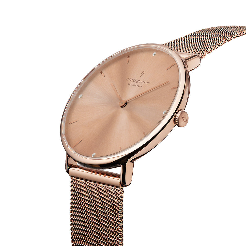 Angled view of the slim case and crown, all in rose gold tone.