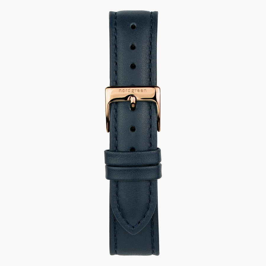 Navy strap with tonal stitching and a rose gold-tone buckle, laid out vertically.