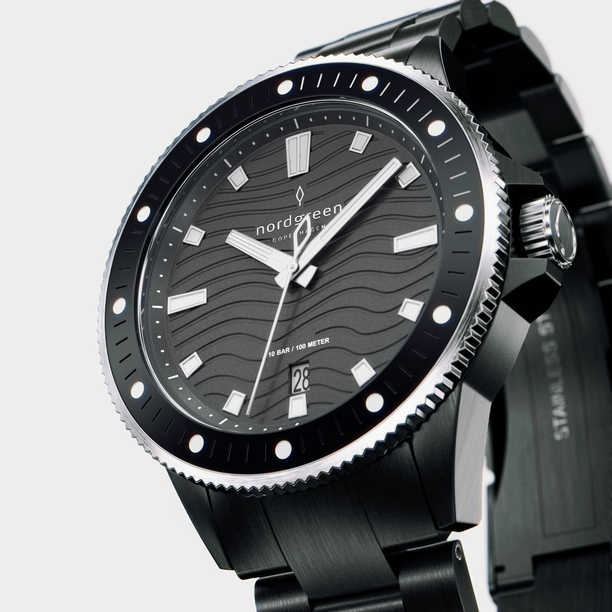 Angled view of the black case, knurled crown and bracelet links.