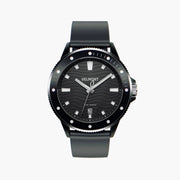 Black diver-style watch with a wave-patterned dial and black rubbery strap, front view.