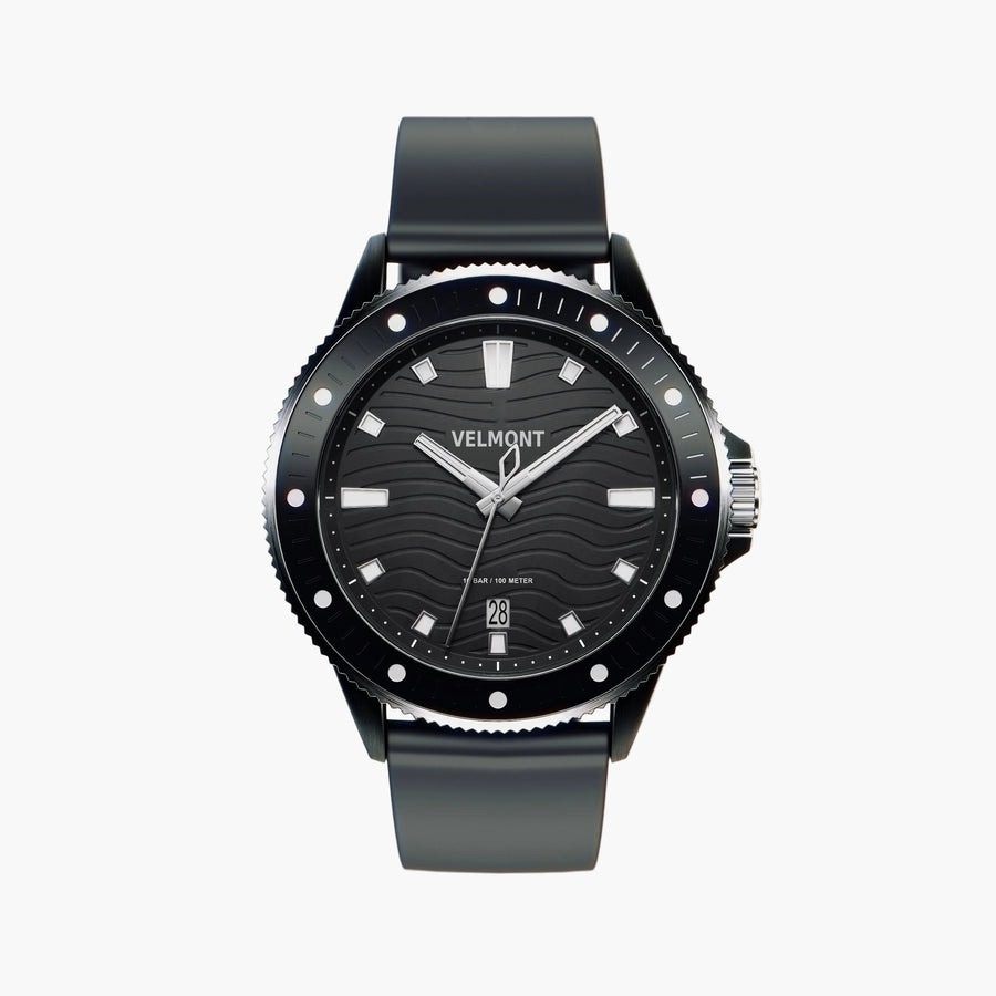 Black diver-style watch with a wave-patterned dial and black rubbery strap, front view.