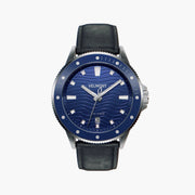 Diver-style watch with a blue wave-pattern dial and blue bezel on a black strap.