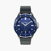 Diver-style watch with a blue wave-patterned dial, blue dotted bezel and dark strap.