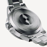 Brushed silver-tone case back and bracelet viewed from below.
