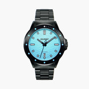 Diver-style watch with a light turquoise wave dial and black bezel on a black link bracelet.