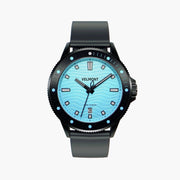Black diver-style watch with a light turquoise wave-patterned dial and dark strap.