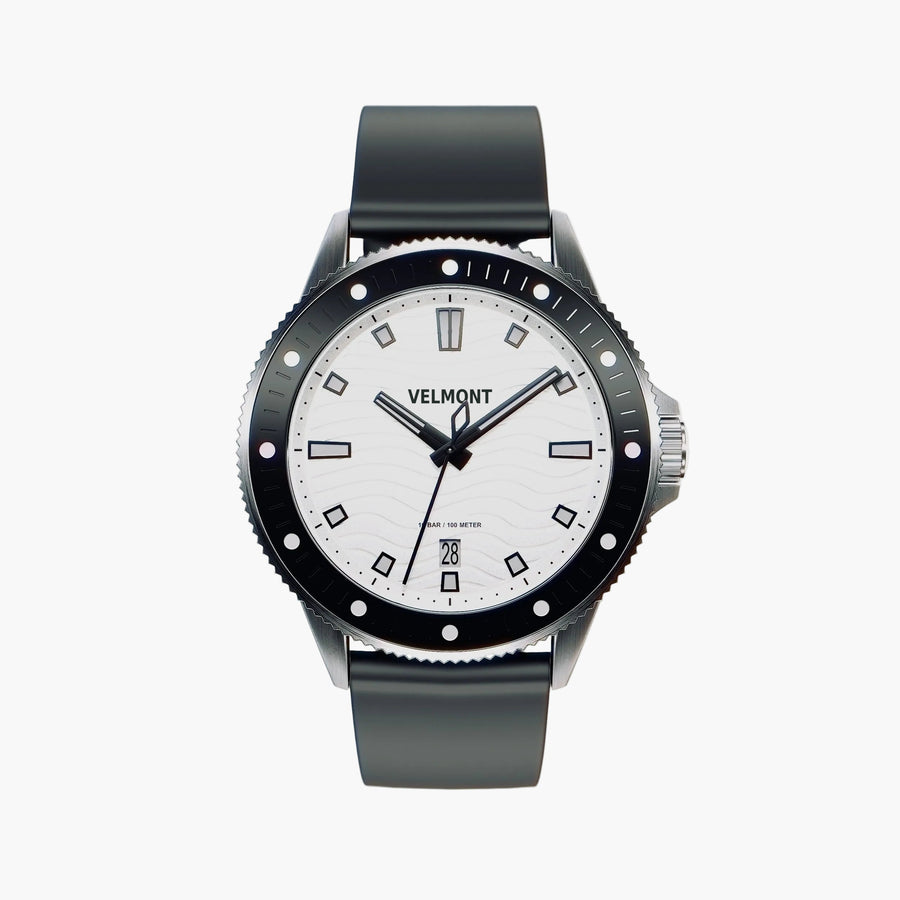 Diver-style watch with a white wave-patterned dial, black dotted bezel and dark gray strap.