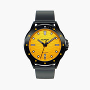 Black diver-style watch with a yellow wave-patterned dial and dark rubbery strap.