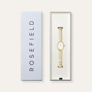Gold-tone oval watch in its gift box