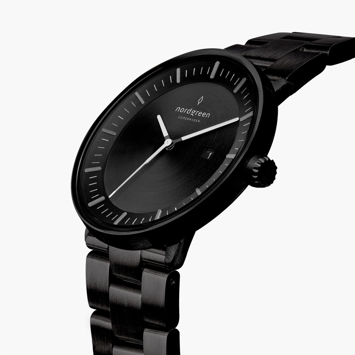 Angled view of the black case, fluted crown and white hands.
