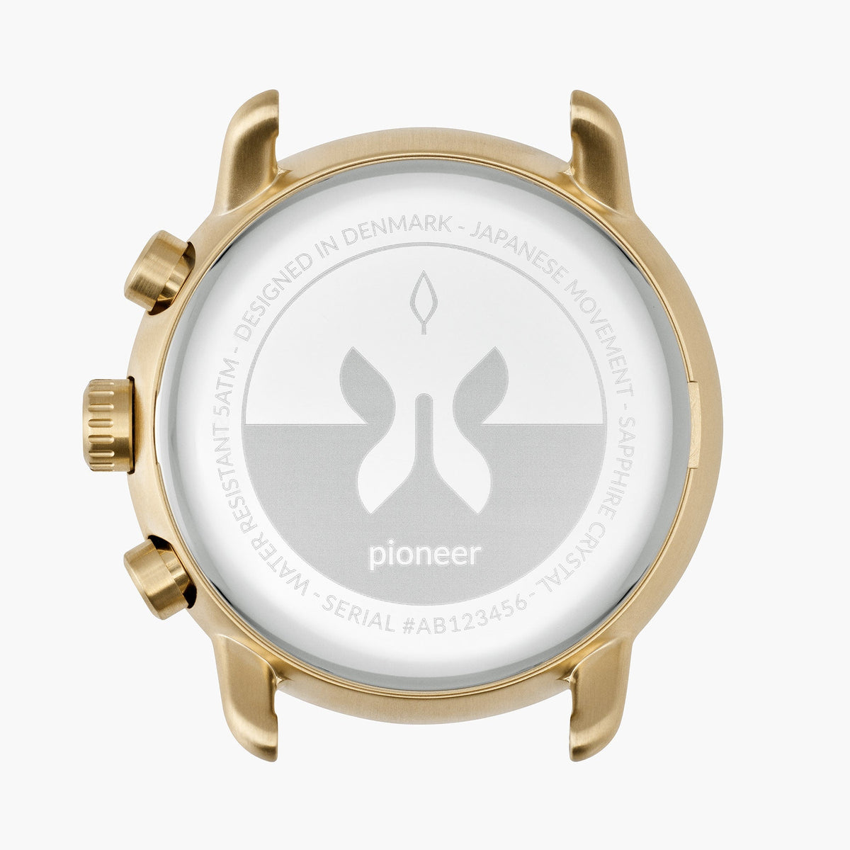 Gold-tone case back with a pale engraved medallion.