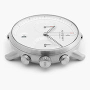 Side profile of the silver-tone case with crown and two pushers.