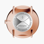 Rose gold-tone case back with a silver-tone engraved medallion.