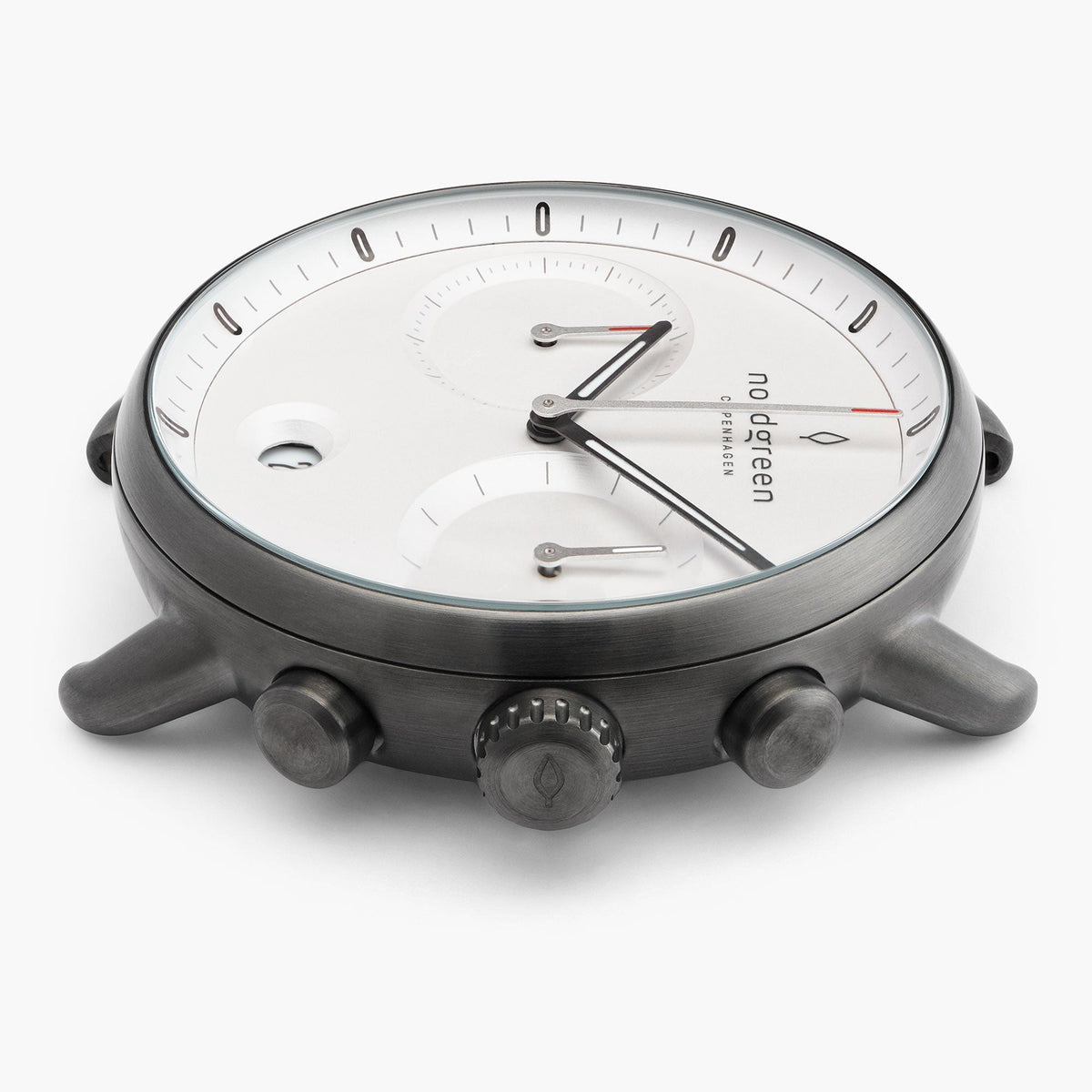 Side profile showing the crown flanked by two pushers in gunmetal.