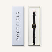 Black square watch in its gift box