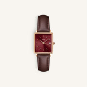 Rose gold-tone square watch with burgundy dial and dark brown strap, front view