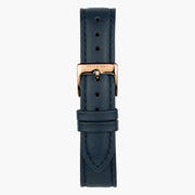 Navy strap with a rose gold-tone pin buckle, laid out flat.