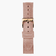 Pink strap with light stitching and a rose gold-tone pin buckle.