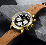 Gold-tone chronograph on stone