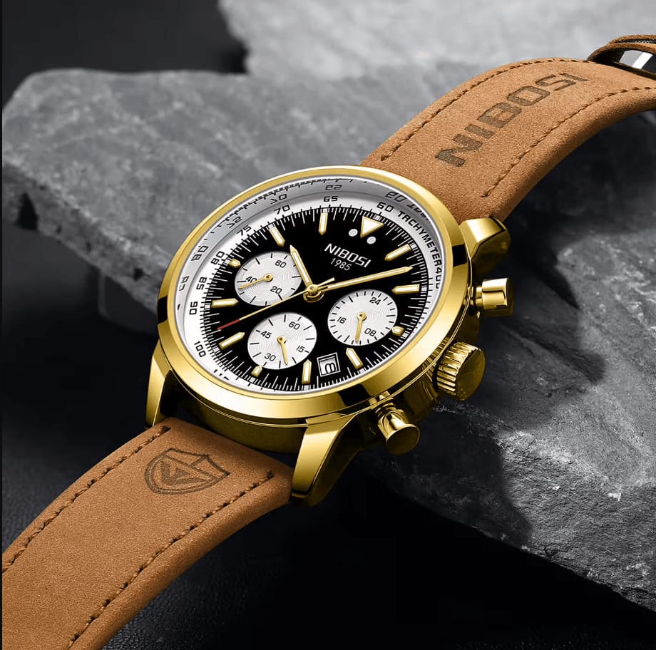 Gold-tone chronograph on stone