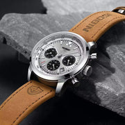 Silver chronograph on a stone surface