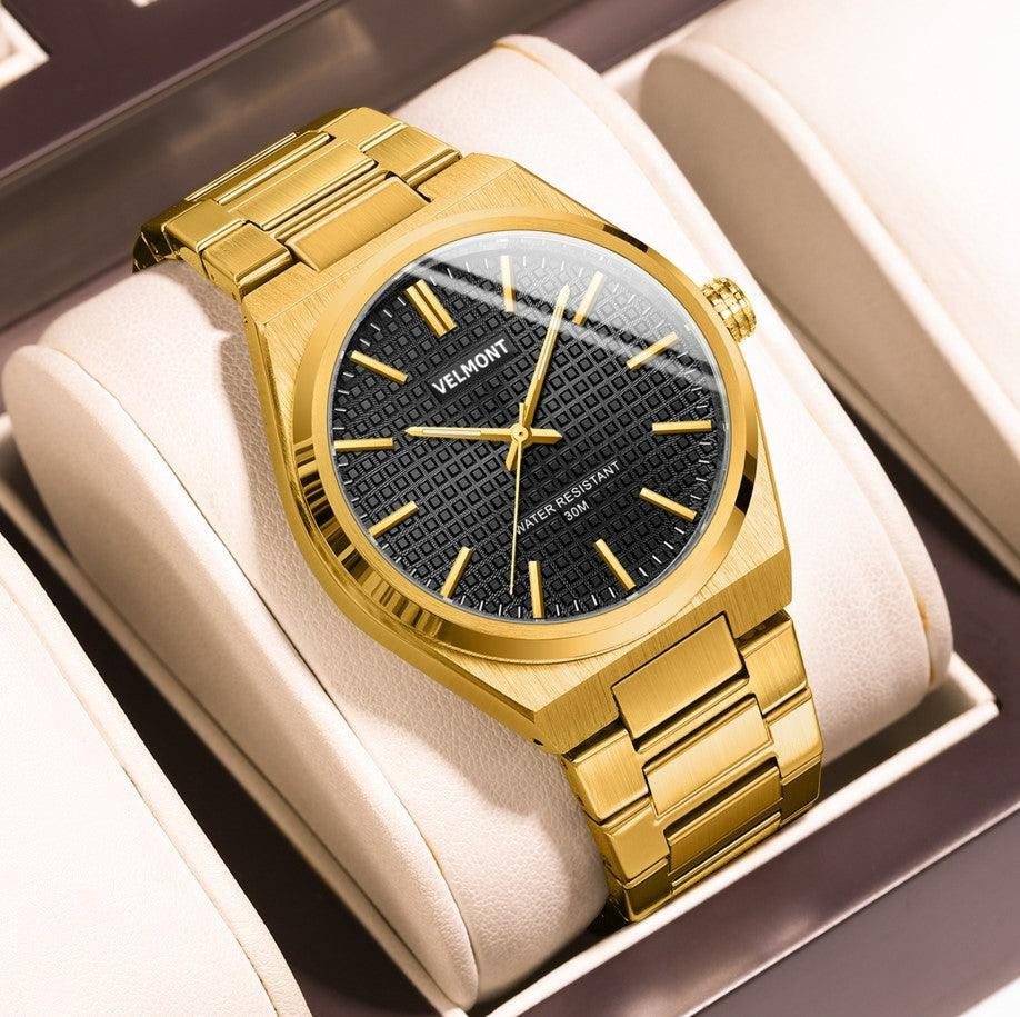 Gold-tone watch in a presentation box