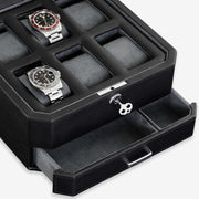 Close-up of watches, key lock and drawer