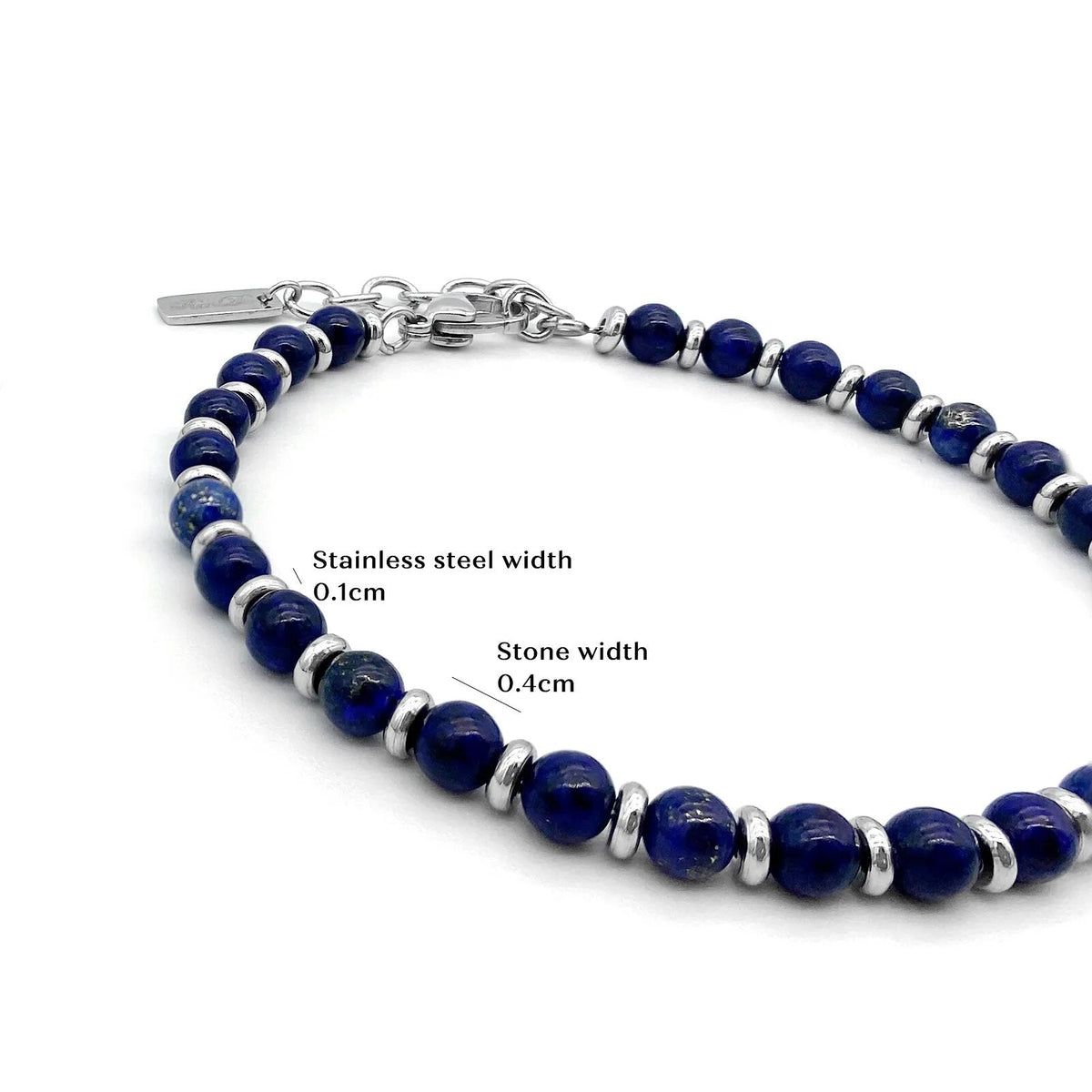 Close-up of the blue beads and steel spacers with size notes