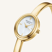 Close-up of the oval case and iridescent dial