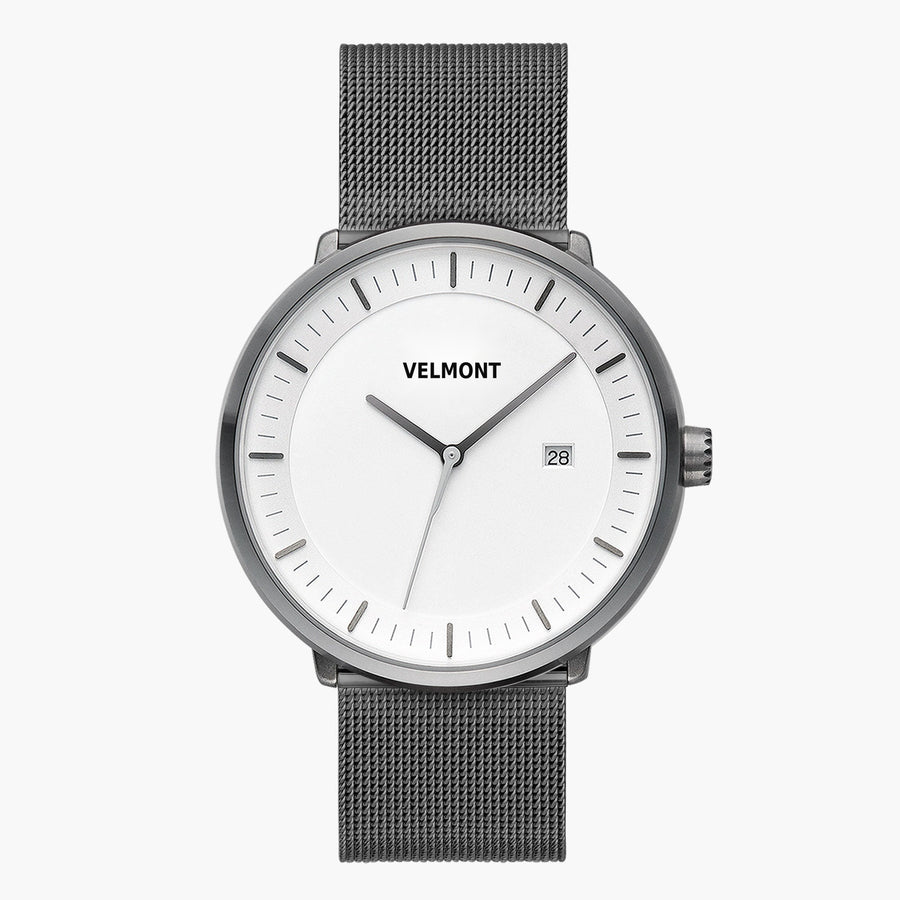 Front view of a gunmetal watch with a white dial on a gunmetal mesh strap.
