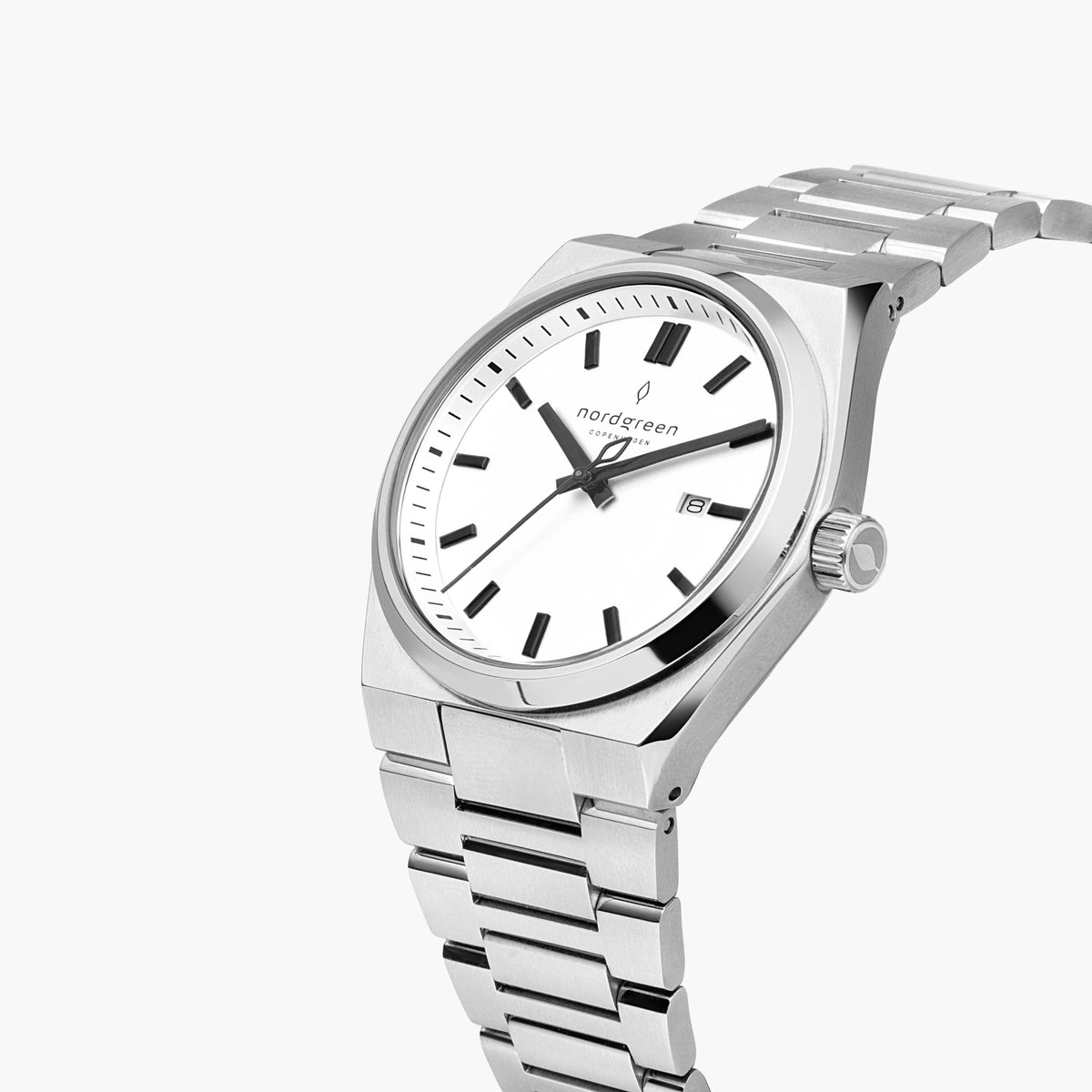 Angled view showing the flat bezel, date window and crown.