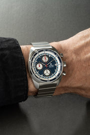 Blue chronograph on the wrist with a bracelet